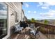 Relax on the deck furnished with chairs and grill, offering scenic views of the surrounding neighborhood at 7536 Grady Cir, Castle Rock, CO 80108