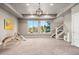 This bonus room features natural light and open space, perfect for a playroom or rec area at 1803 Avenida Del Sol, Castle Rock, CO 80104
