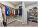 Walk-in closet with built-in shelving and ample storage for clothing and accessories at 1803 Avenida Del Sol, Castle Rock, CO 80104