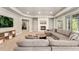 Cozy living area, featuring a fireplace and plush seating, creates a warm and inviting atmosphere at 1803 Avenida Del Sol, Castle Rock, CO 80104