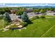 Aerial view of a landscaped green space in the Atlas Valley community with mountain views at 1542 Kilkenny St, Boulder, CO 80303