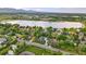 Breathtaking aerial view of the lake and community, close to natural amenities at 5683 Fig Way, Arvada, CO 80002