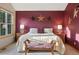 Comfortable main bedroom with a large window and stylish decor with a wooden bench at 5683 Fig Way, Arvada, CO 80002