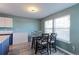 Bright breakfast nook featuring a dining table, four chairs, and ample natural light at 13068 Harrison Dr, Thornton, CO 80241