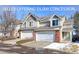 Charming townhouse with a two-car garage, brick accents, and well-maintained landscaping in a desirable neighborhood at 13068 Harrison Dr, Thornton, CO 80241