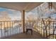 Balcony overlooking pond and winter trees at 3082 S Wheeling Way # 410, Aurora, CO 80014