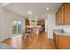 Open floor plan showing the kitchen, dining area, and cabinetry with stainless appliances at 1936 Alpine Dr, Erie, CO 80516