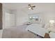 Spacious main bedroom with a bay window, vaulted ceiling, and neutral carpet at 1936 Alpine Dr, Erie, CO 80516