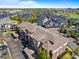 Aerial view of a residential neighborhood, featuring rooftops, green spaces, and roadways at 3865 S Dayton St # 105, Aurora, CO 80014