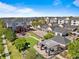 Community aerial view showcasing playground, barbecue area, garages, and well-maintained apartment buildings at 3865 S Dayton St # 105, Aurora, CO 80014