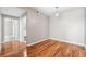 Bright bedroom with hardwood floors, offering a comfortable retreat at 3865 S Dayton St # 105, Aurora, CO 80014
