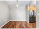 Open dining area adjacent to the kitchen with wood floors, offering a versatile space at 3865 S Dayton St # 105, Aurora, CO 80014