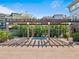 Outdoor hot tub with overhead trellis that provides shade, great for relaxing and entertaining at 3865 S Dayton St # 105, Aurora, CO 80014