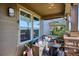 Inviting covered porch with comfortable seating and stylish decor at 2012 Sagerock Dr, Castle Pines, CO 80108