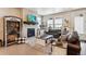 Cozy living room featuring a fireplace, modern decor, and comfortable leather seating at 2012 Sagerock Dr, Castle Pines, CO 80108