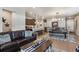 Inviting living space adjacent to the kitchen and dining area, perfect for entertaining at 2012 Sagerock Dr, Castle Pines, CO 80108