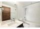 Stylish bathroom featuring a modern vanity, shower and tub combination, and contemporary fixtures at 3057 S University Cir, Englewood, CO 80113