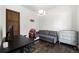 Bright office features hardwood flooring, modern furniture and plenty of natural light at 3057 S University Cir, Englewood, CO 80113