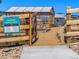 Community garden with garden beds and a greenhouse at 1256 Elbridge Dr, Elizabeth, CO 80107