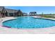 Community pool with nice seating and a covered picnic area at 1256 Elbridge Dr, Elizabeth, CO 80107