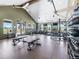 Community gym with high ceilings, several windows, and workout equipment at 1256 Elbridge Dr, Elizabeth, CO 80107