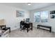 Bright office space with a large window, a desk, and neutral carpet at 1256 Elbridge Dr, Elizabeth, CO 80107