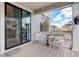 Relaxing patio area features an outdoor dining set perfect for enjoying summer evenings at 1256 Elbridge Dr, Elizabeth, CO 80107