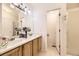 Bathroom features double sinks, decorative accents, and a shower at 11014 Callaway Rd, Parker, CO 80138