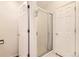 Bright bathroom featuring a shower with a glass enclosure at 11014 Callaway Rd, Parker, CO 80138