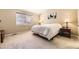 Bright bedroom with plush carpet and ample natural light at 11014 Callaway Rd, Parker, CO 80138