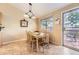 Cozy dining area with natural light and access to the outdoor deck at 11014 Callaway Rd, Parker, CO 80138