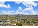 Expansive city view showcasing the skyline with fluffy clouds and clear blue skies at 2065 Depew St, Edgewater, CO 80214