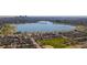 Scenic aerial view of a cityscape and lake offering a picturesque neighborhood setting at 2065 Depew St, Edgewater, CO 80214