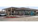 A Shake Shack establishment with outdoor seating and sleek modern design elements at 2065 Depew St, Edgewater, CO 80214