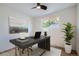 Bright home office with modern desk, comfortable chair, and a large window for natural light at 2065 Depew St, Edgewater, CO 80214