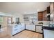 Modern kitchen with sleek countertops, ample cabinet space, and stainless steel appliances for a contemporary feel at 2065 Depew St, Edgewater, CO 80214