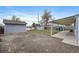 The backyard includes two sheds and a covered patio, offering storage and outdoor space at 7460 Krameria Dr, Commerce City, CO 80022