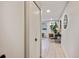 Hallway with seating area, house plants, and modern decor at 937 Clarkson St # 101, Denver, CO 80218