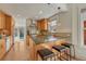 Modern kitchen features custom cabinets, stainless steel appliances, and a center island at 1716 S Ogden St, Denver, CO 80210