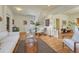 Open-concept living room with hardwood floors, and elegant furnishings at 1716 S Ogden St, Denver, CO 80210