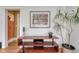 Contemporary living room features wood floors, modern furniture, and stylish decor at 1716 S Ogden St, Denver, CO 80210