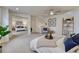 Bright bedroom features a mirror closet, decor, and a ceiling fan at 1716 S Ogden St, Denver, CO 80210