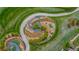 Aerial view of landscaped gardens with walking path at 26741 E Arbor Dr, Aurora, CO 80016