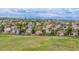 Breathtaking aerial view of a well-planned neighborhood with houses nestled amid sprawling greenery at 26741 E Arbor Dr, Aurora, CO 80016