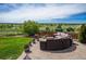 Inviting backyard patio with comfortable seating and a beautiful view of the community at 26741 E Arbor Dr, Aurora, CO 80016