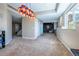 Open finished basement area with carpet floors, recessed lights and colorful art deco light fixture at 26741 E Arbor Dr, Aurora, CO 80016