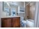 Cozy bathroom featuring a vanity with storage, combined tub and shower, and medicine cabinet at 26741 E Arbor Dr, Aurora, CO 80016