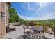 Relaxing deck with comfortable seating and scenic views of the surrounding landscape at 26741 E Arbor Dr, Aurora, CO 80016