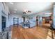 Spacious living room with hardwood floors, fireplace, and open layout at 26741 E Arbor Dr, Aurora, CO 80016