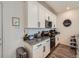 Well-lit kitchen featuring granite countertops, stainless steel appliances, and ample cabinet space at 17991 E 103Rd Ave, Commerce City, CO 80022